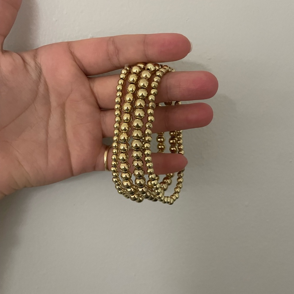 Revolve gold beaded bracelet set
